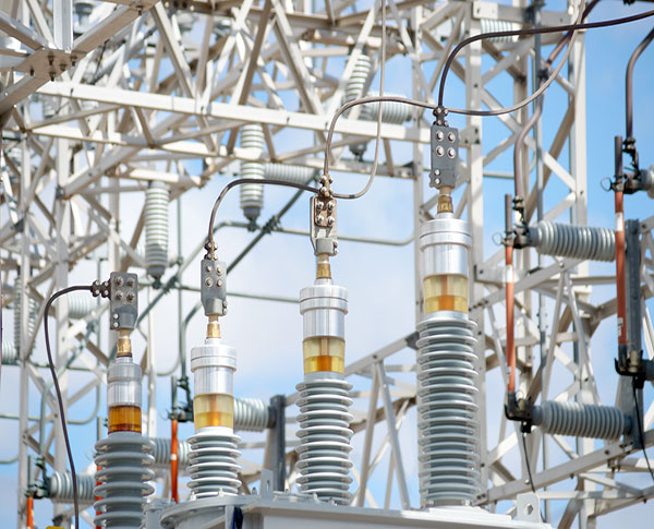 Transmission lines running across vast dry lands
