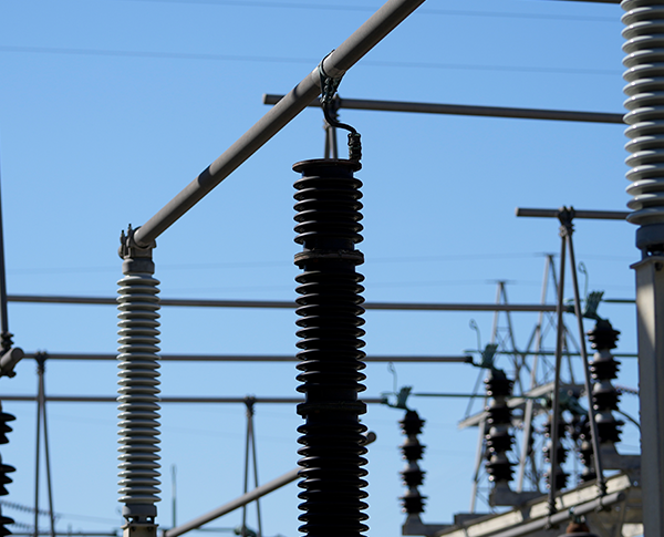 Transmission lines running across vast dry lands